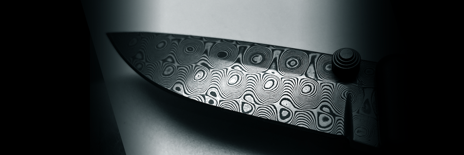 Veitsi, damaskiteräksinen.